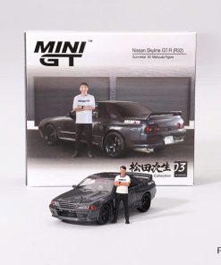 MiniGT Nissan R32 Gunmetal with Matsuda figure